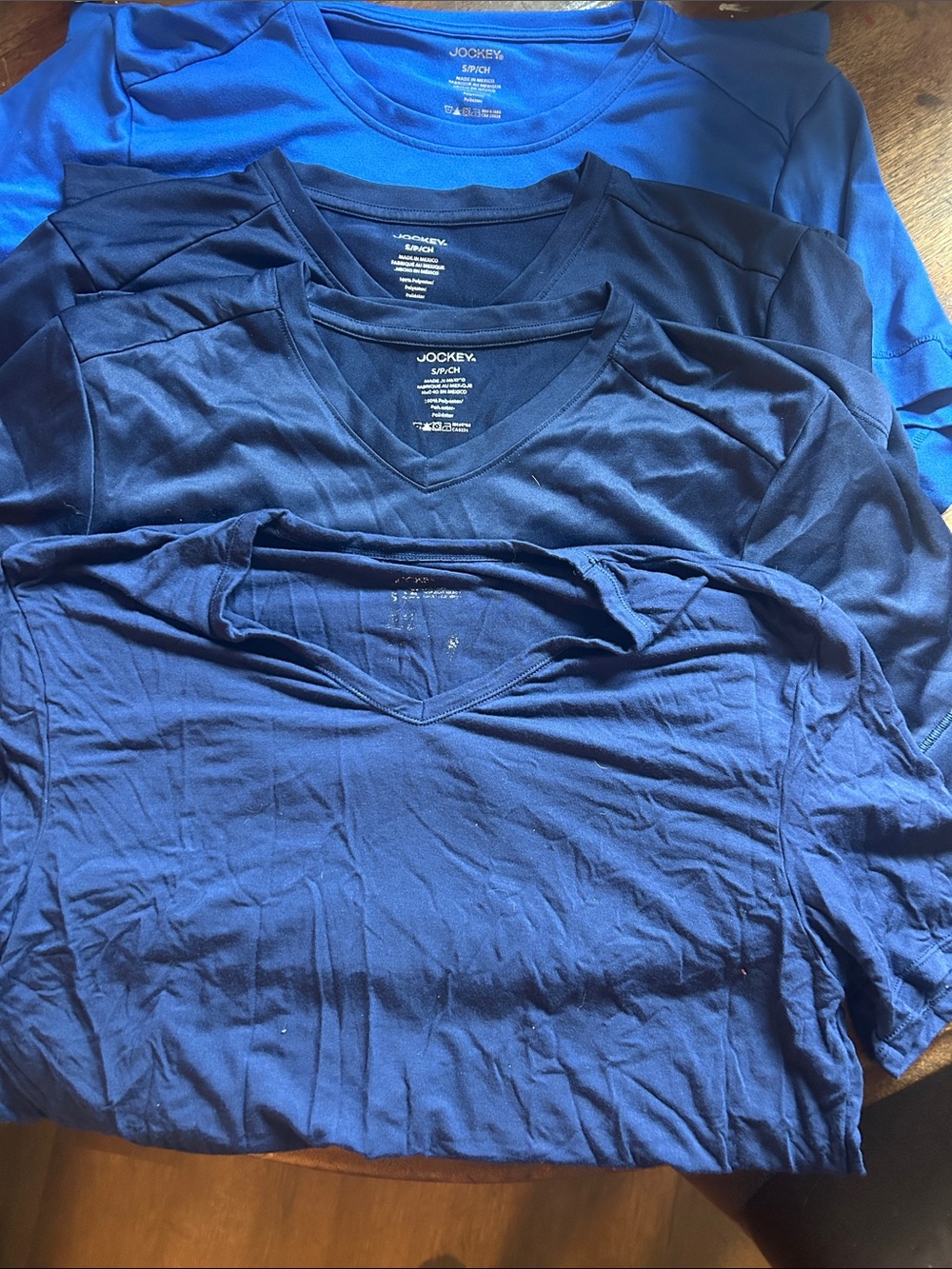 3 Jockey Navy Blue v neck undershirts & 1 royal blue crew neck